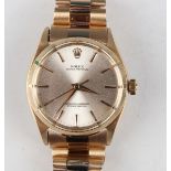 A Rolex Oyster Perpetual 9ct gold gentleman's bracelet wristwatch, Ref. 1003, the signed jewelled