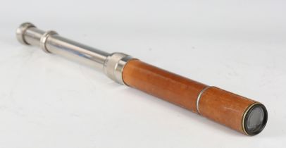 A mid-20th century Britex Spotter leather bound two-draw telescope, unextended length 29.8cm,