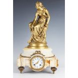 A late 19th century French ormolu and onyx mantel clock with eight day movement striking on a