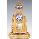 A late 19th century French gilt spelter and Sèvres style porcelain mantel clock with eight day