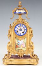 A late 19th century French gilt spelter and Sèvres style porcelain mantel clock with eight day