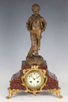 An early 20th century marble, brown patinated and gilt spelter mantel clock with eight day