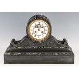 A late 19th century French black slate and marble mantel clock with eight day movement striking on a