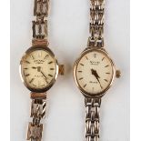 An Accurist Diamond 9ct gold lady's bracelet wristwatch, the signed oval dial with gilt baton hour