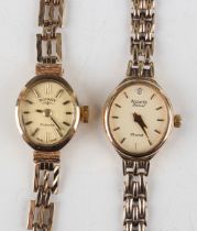 An Accurist Diamond 9ct gold lady's bracelet wristwatch, the signed oval dial with gilt baton hour