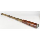 An early 20th century First World War period leather mounted brass three-draw telescope, detailed '