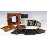A late 19th century mahogany and gilt brass plate camera (faults), with various accessories.Buyer’