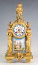 A late 19th century French gilt spelter and Sèvres style porcelain mantel clock with eight day