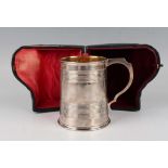 A Victorian silver christening tankard of tapering cylindrical form with reeded horizontal