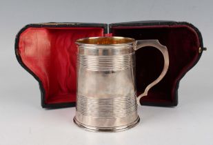 A Victorian silver christening tankard of tapering cylindrical form with reeded horizontal