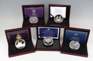 A group of five Elizabeth II five-ounce silver ten pounds coins celebrating Royalty and Royal