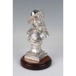 A silver bust of a cavalier on a square socle base, unmarked, weight 338.8g, screw fitted to a