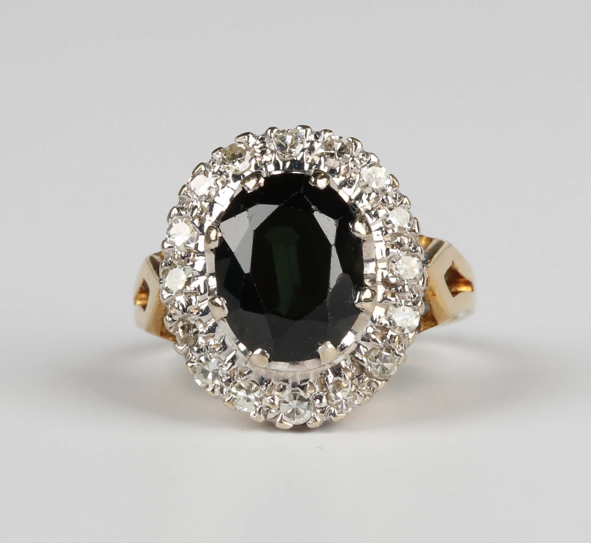 A gold, green sapphire and diamond oval cluster ring, claw set with the oval cut green sapphire - Image 5 of 5