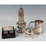 A George V silver tankard of girdled tapering cylindrical form with scroll handle, London 1919 by