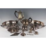 An Elizabeth II silver stub candlestick with urn shaped sconce, on a circular stepped base,