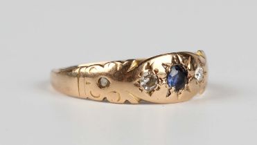 A late Victorian 15ct gold, sapphire and diamond ring, mounted with the central cushion cut sapphire