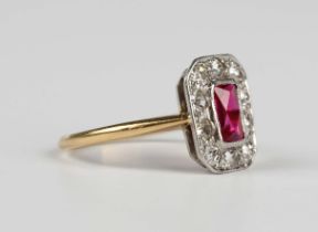 A gold, platinum, diamond and synthetic ruby rectangular cluster ring, mounted with the