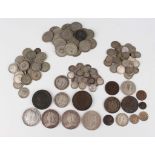 A collection of various British and world coins, including a George IV crown 1821, two Victoria