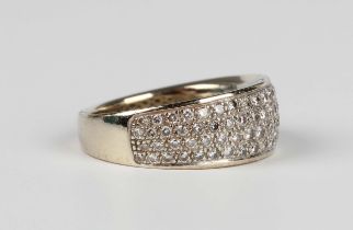 An 18ct white gold and diamond ring, pavé set with four rows of circular cut diamonds, detailed '750