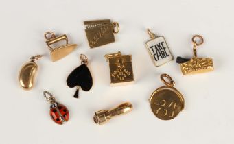 Two 9ct gold charms, comprising a bottle in a basket and an 'I Love You' rotating charm, five