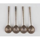 A set of four Russian silver gilt and niello spoons, 84 zolotnik, each fig shaped bowl back monogram