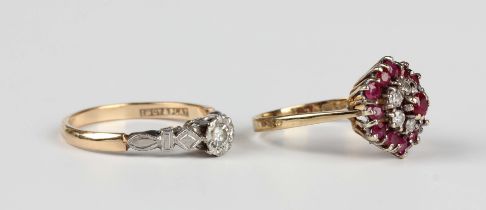 A gold, platinum and diamond ring, mounted with a circular cut diamond between decorated