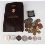 A group of British and world coins, including a Netherlands two-and-a-half guilders 1937, mounted as