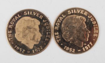 Two Elizabeth II Silver Jubilee 1952-1977 9ct gold commemorative medallions, each cased.Buyer’s