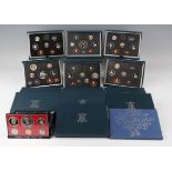 A collection of Royal Mint year-type coin sets, including a United States six-coin proof set 1979.