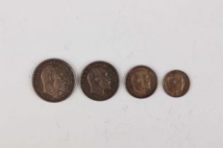 An Edward VII four-coin Maundy set 1903.Buyer’s Premium 29.4% (including VAT @ 20%) of the hammer