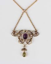 An Edwardian gold, amethyst, peridot and seed pearl pendant necklace of Suffragette interest, the