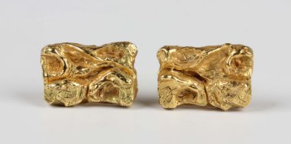 A pair of gold rectangular cufflinks with cast bark decoration, with folding sprung bar fittings,