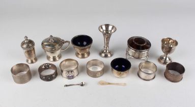 A George VI silver three-piece condiment set of tapered circular form with cast rims, comprising