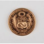 A Peru gold fifty soles 1965, together with a gold mount, unmarked, weight of mount 2.6g.