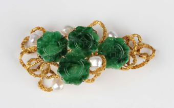 An Asian gold, jade and freshwater cultured pearl brooch, mounted with four shaped circular jades