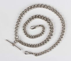 A silver curblink Albert watch chain, fitted with two silver swivels, one detailed 'SS', and a