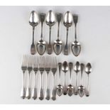 A set of six George IV silver Fiddle pattern dessert spoons and forks, London 1824 by William