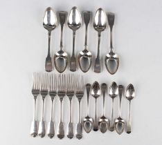 A set of six George IV silver Fiddle pattern dessert spoons and forks, London 1824 by William