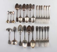 An early 19th century harlequin part canteen of silver Fiddle pattern cutlery, comprising four