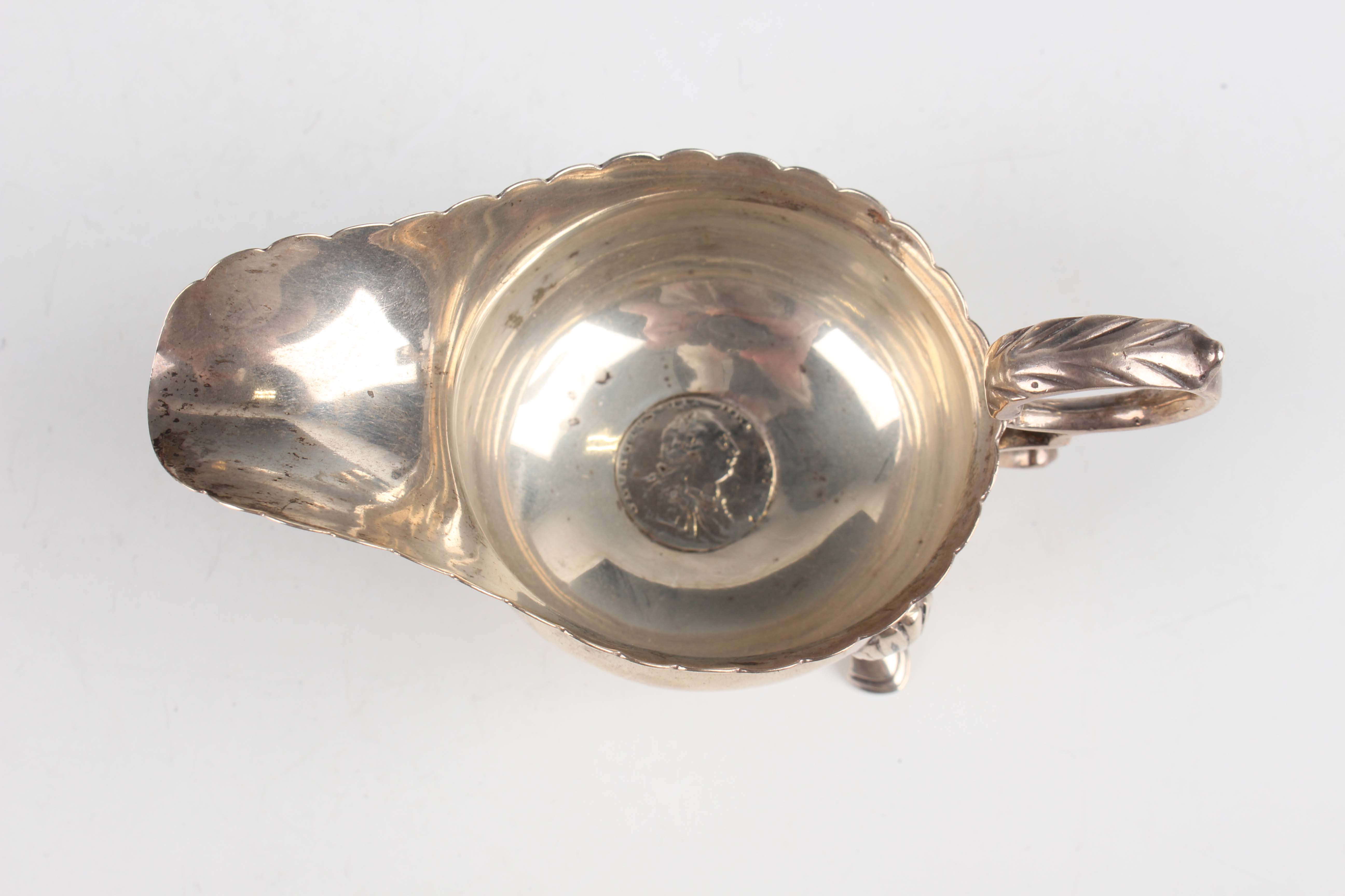 A George V silver tankard of girdled tapering cylindrical form with scroll handle, London 1919 by - Image 3 of 5