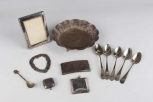 A small group of silver, including a set of five George III Old English pattern teaspoons, London
