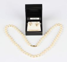 A single row necklace of uniform cultured pearls on a 9ct gold oval clasp, length 53cm, and a pair