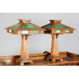 A pair of modern American Mission style oak framed table lamps, the architectural shades inset