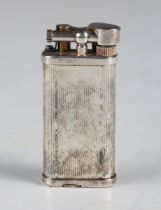 A Dunhill 'Unique' silver plated gas lighter with banded decoration, detailed 'Made in England',