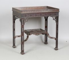 A late 19th century Chinese Chippendale mahogany silver table with pierced fretwork gallery and