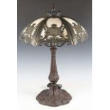 An early 20th century American bronzed spelter table lamp, in the manner of Bradley & Hubbard, the