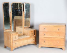 An early 20th century Heals style oak chest of three drawers, height 81cm, width 83cm, depth 45cm,