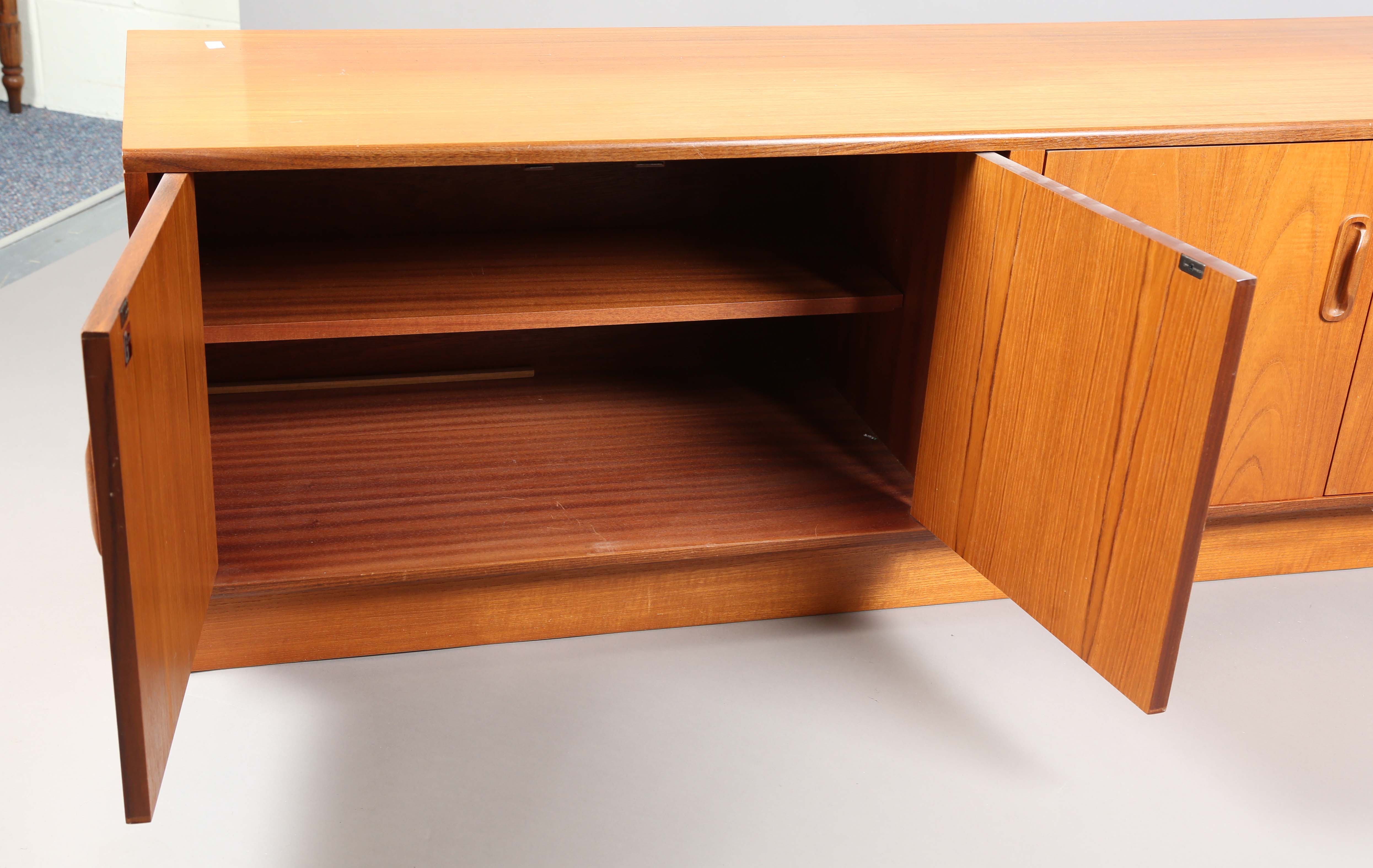 A mid-20th century G-Plan teak low sideboard, fitted with four doors, height 53cm, width 162cm, - Image 5 of 9