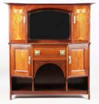 An Edwardian Arts and Crafts mahogany side cabinet by Shapland & Petter of Barnstaple, the