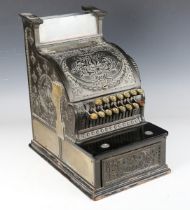 A late 19th/early 20th century cast brass 'National' cash register till, cast in relief with foliate